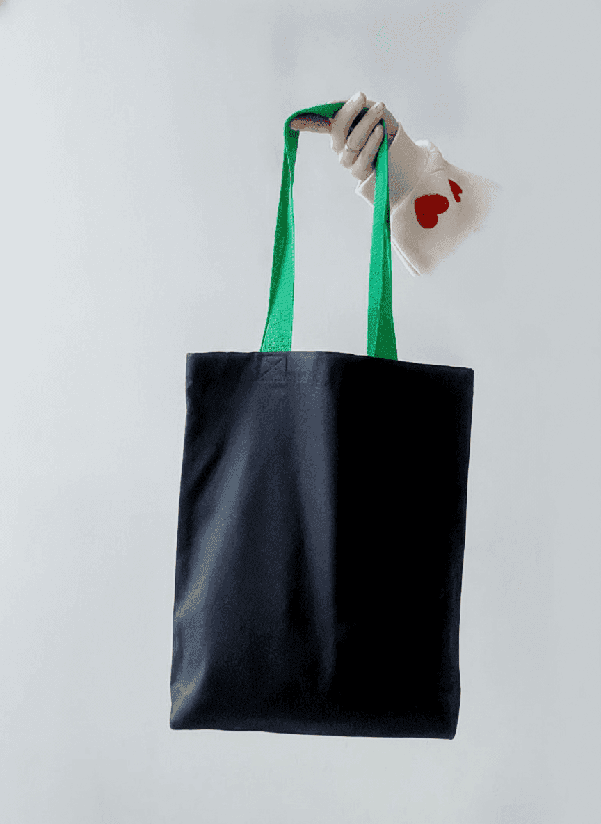 Black cotton twill tote with green handles