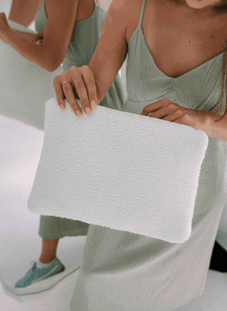 White sherpa-lined laptop sleeve with zipper