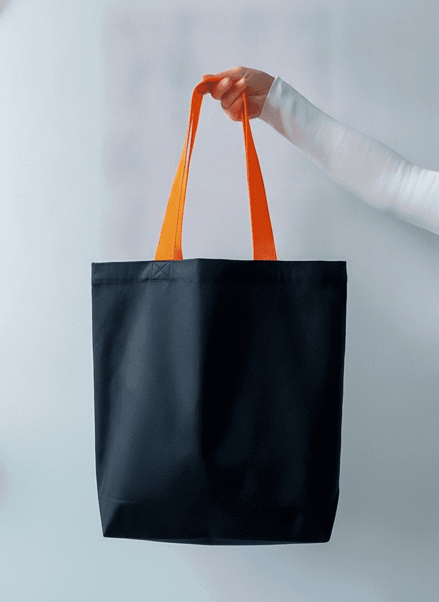 Lavasta tote bag with orange handles and pocket