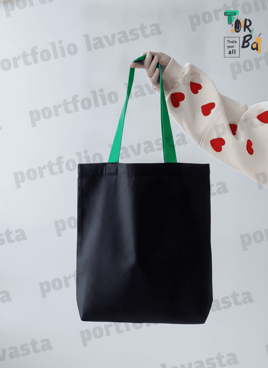 Black cotton twill tote with green handles