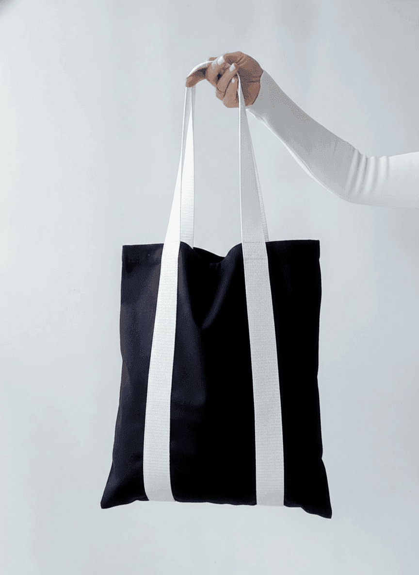 Black twill tote bag with white patches
