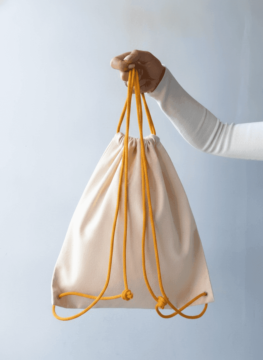 Beige Twill Drawstring Backpack with Orange Cords
