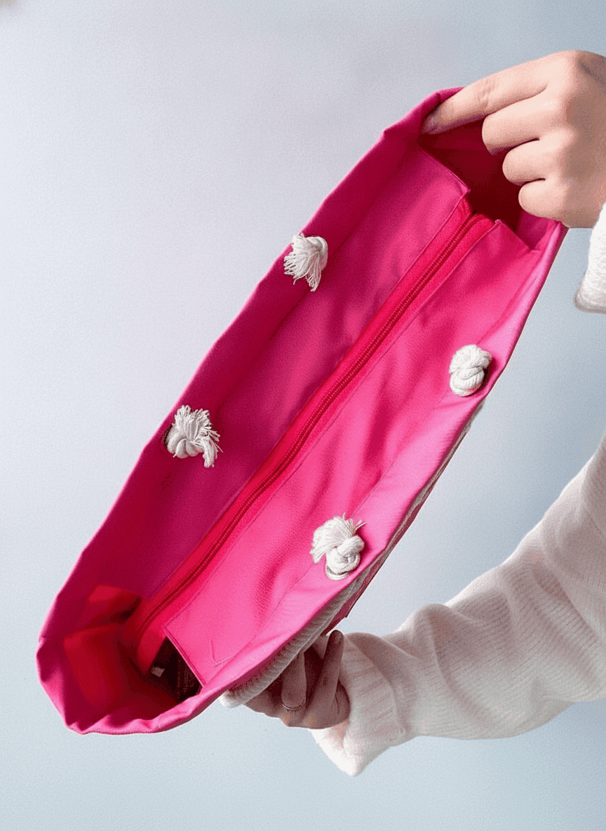 Pink structured tote bag with rope handles