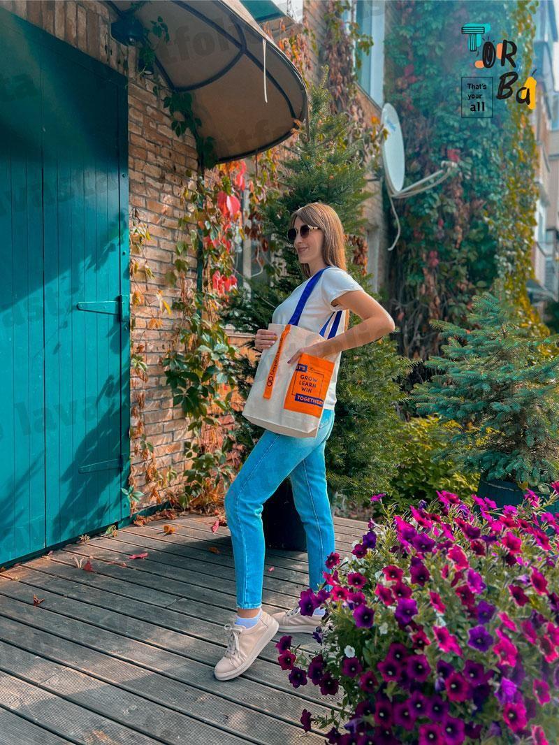 Котонова торба шопер сумка з синьою ручкаю нашивною стрічкою і кишенею помаранчевого кольору без друку