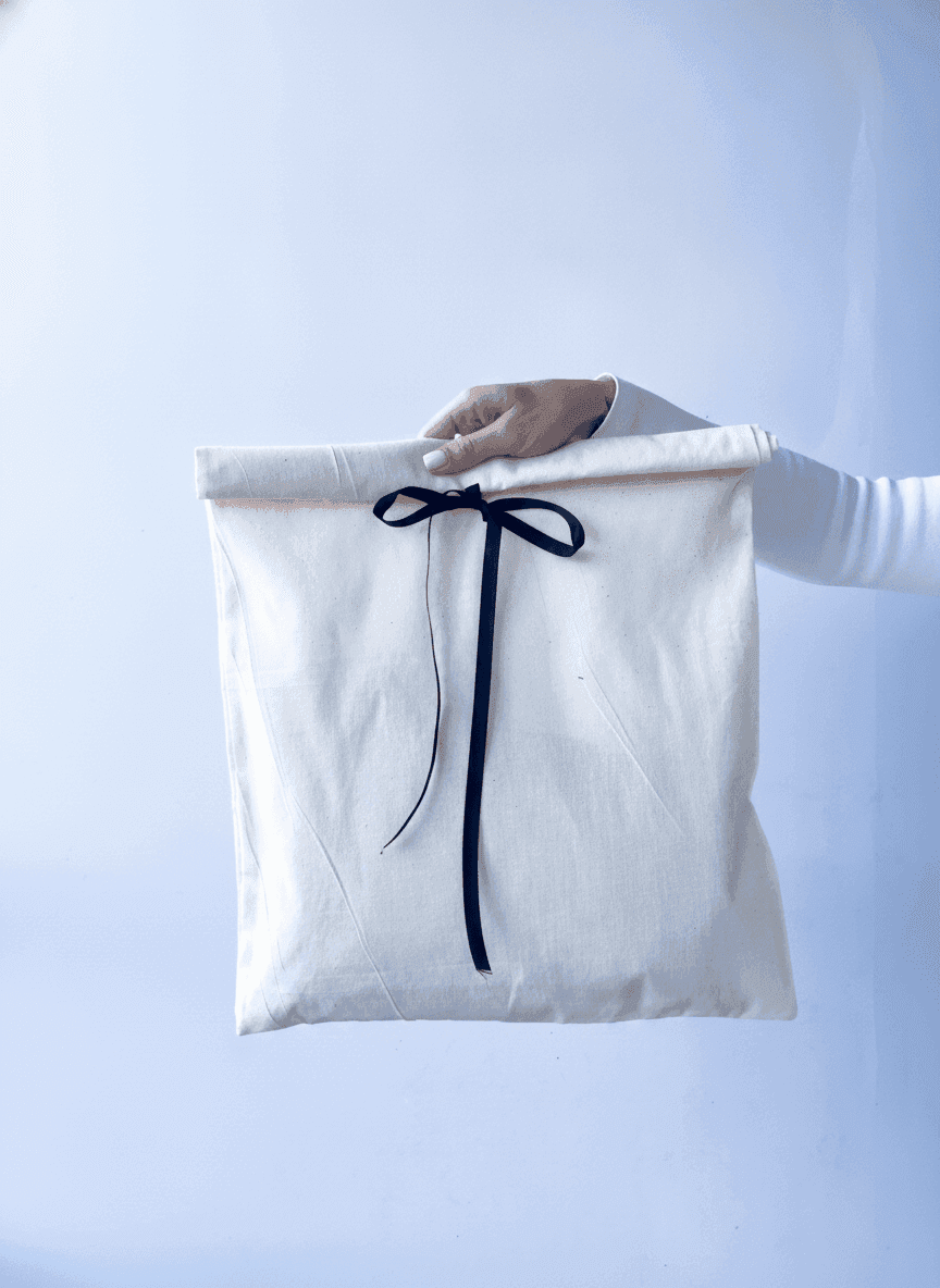 Beige Muslin Drawstring Bag with Black Ribbon