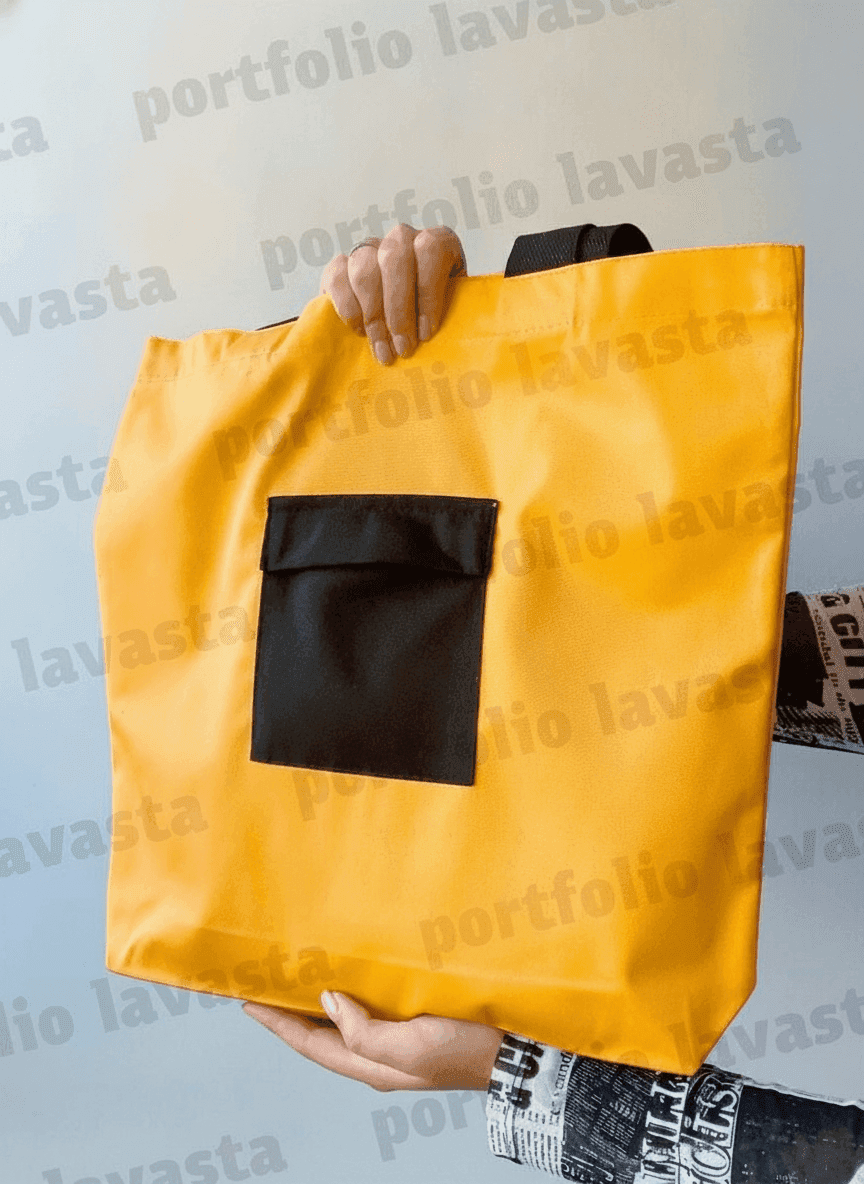 Yellow tote bag with black handles & exterior pocket