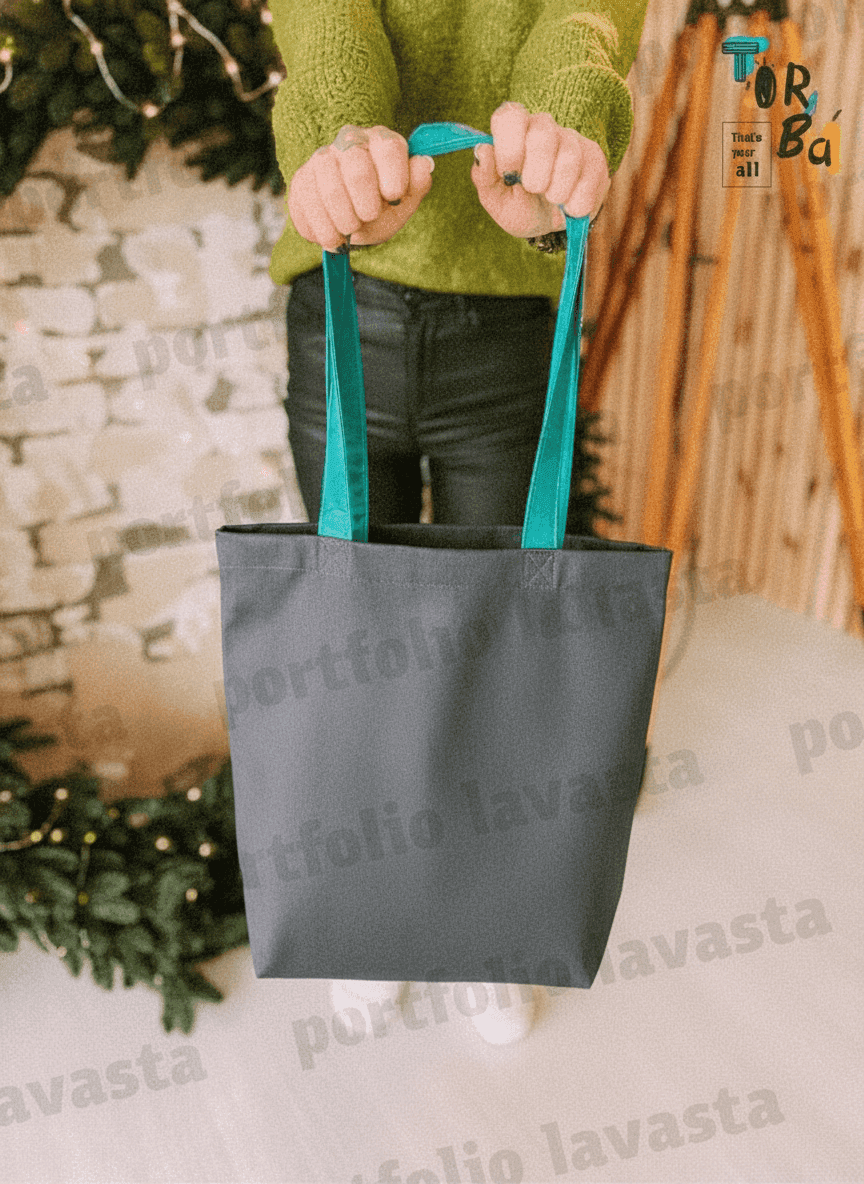 Gray tote bag with turquoise handles