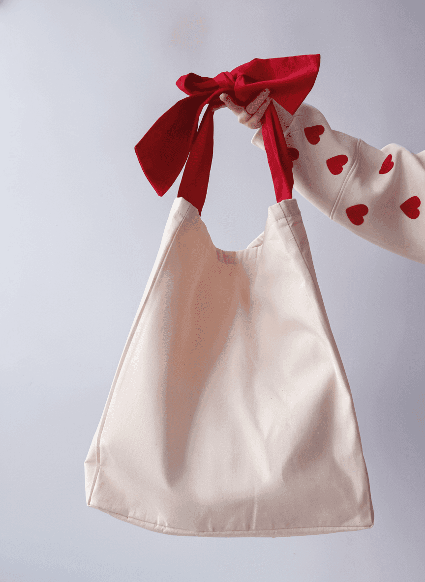 Light Tote Bag with Decorative Handles & Red Bow