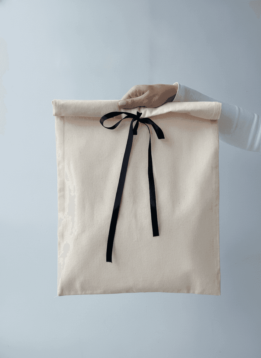 Calico pouch with ribbon tie and flap