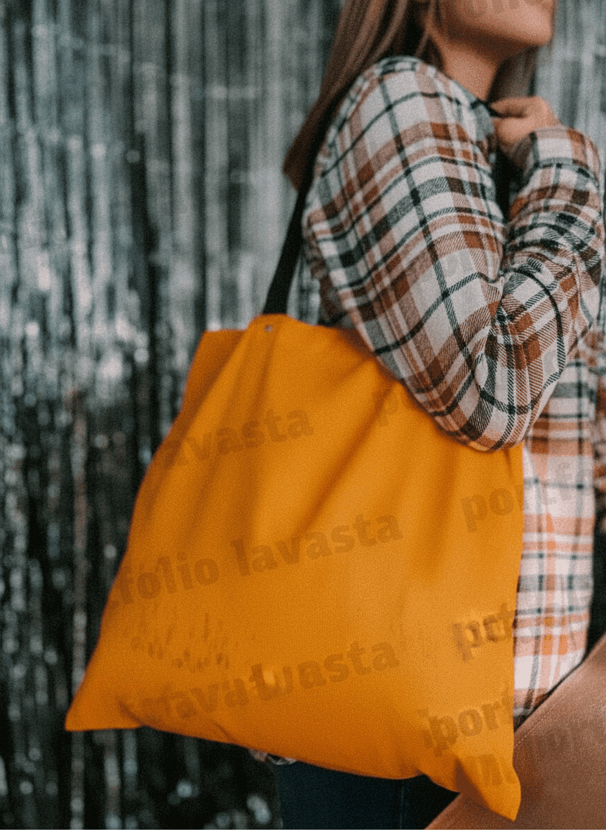 Orange tote bag with rivet handles