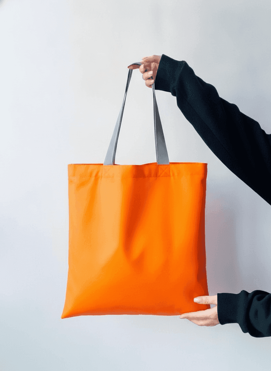 Waterproof tote bag with long reflective strap