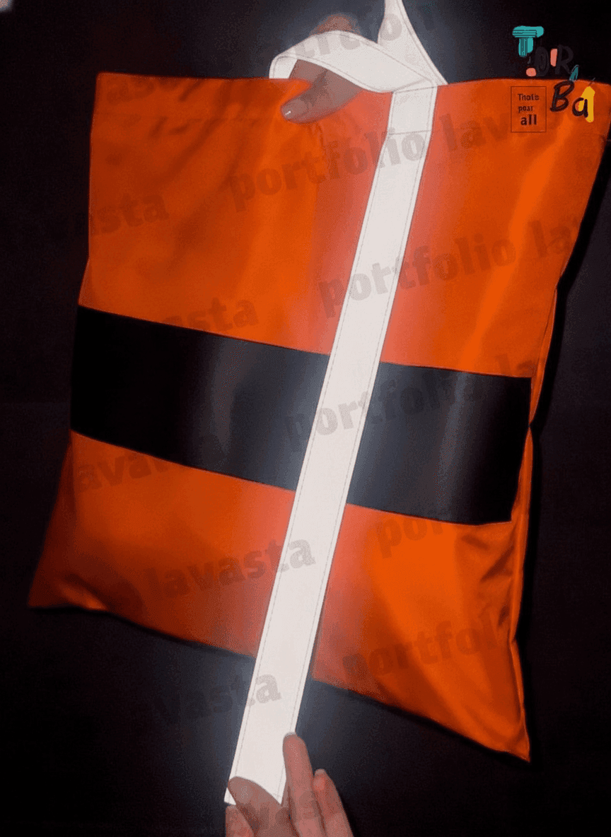 Waterproof tote bag with long reflective strap