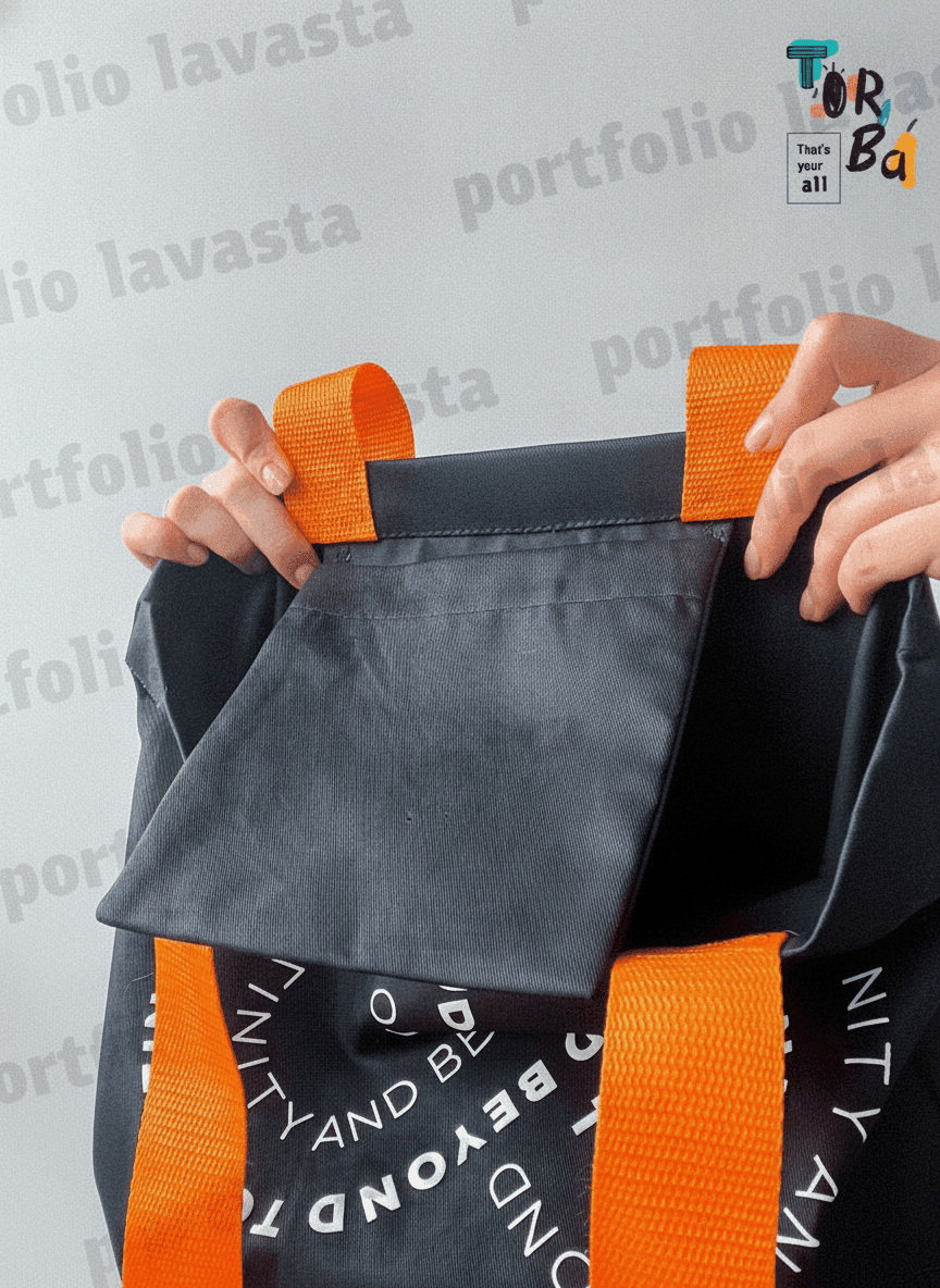 Lavasta tote bag with orange handles and pocket